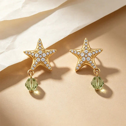 Aretes Estrella de Mar Dorada con Zirconias