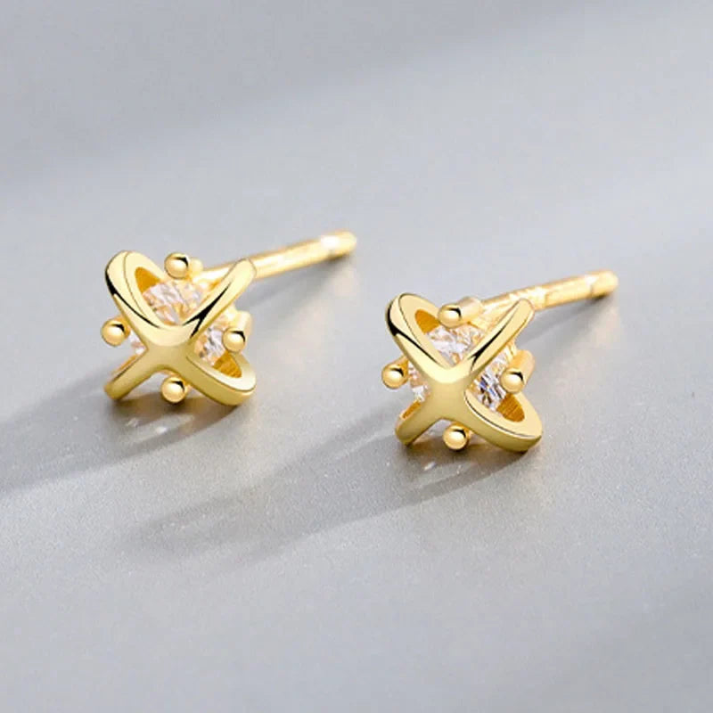 Aretes Planeta con Zirconias