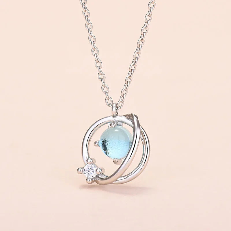Anillo, Collar o Aretes de Cristal Azul