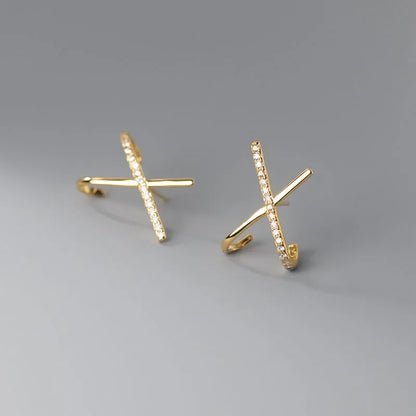 Aretes Cruz Delicada con Zirconias