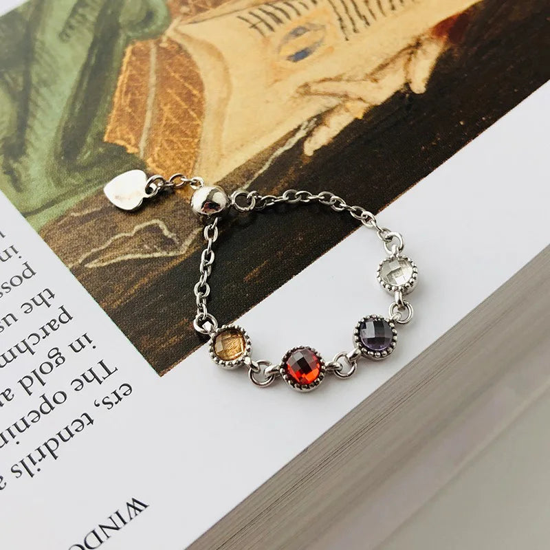 Anillo Cadena con Zirconias de Colores