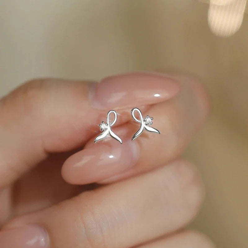 Aretes Cola de Pez con Zirconias