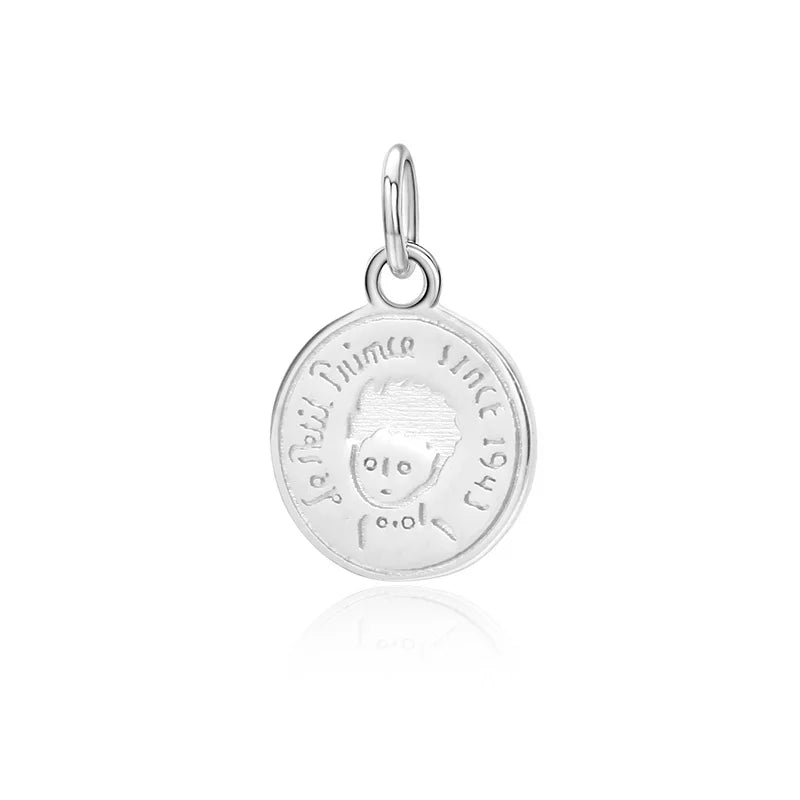 Dije Moneda con Niño