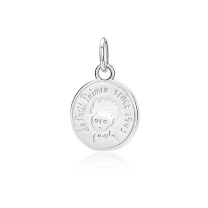 Dije Moneda con Niño