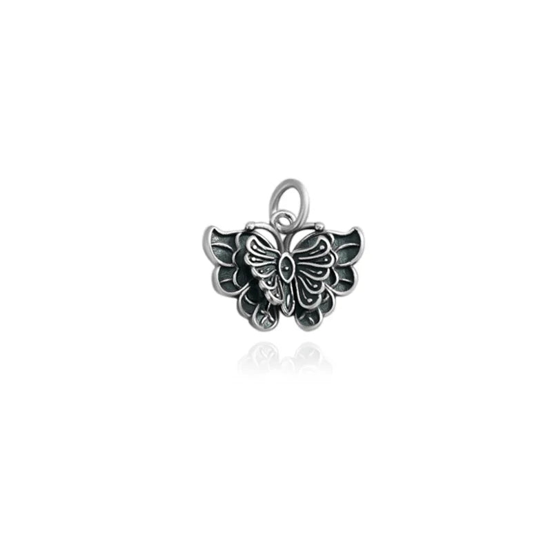 Dije Mariposa Blanca o Negra