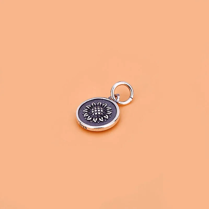 Dije Moneda con Girasol