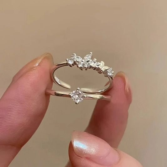 Anillo Abierto con Zirconias en Dos Modelos