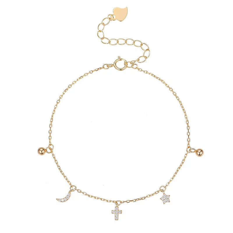 Pulsera Estrella, Luna y Cruz con Zirconias