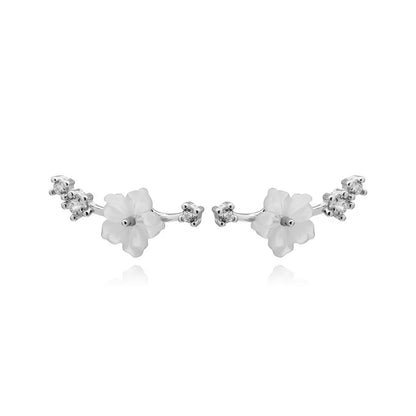Aretes Flor de Concha con Zirconias