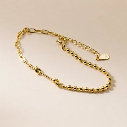 Pulsera de Bolitas Anudadas