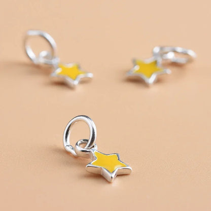 Dije Estrella Amarilla