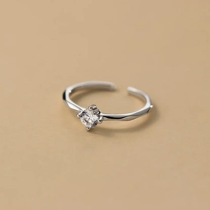 Anillo Abierto con Zirconias en Dos Modelos
