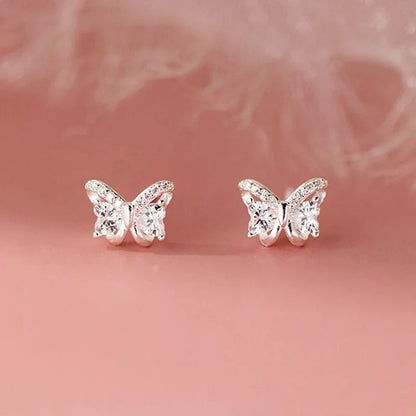 Aretes Moño con Corazón y Piedras Brillantes