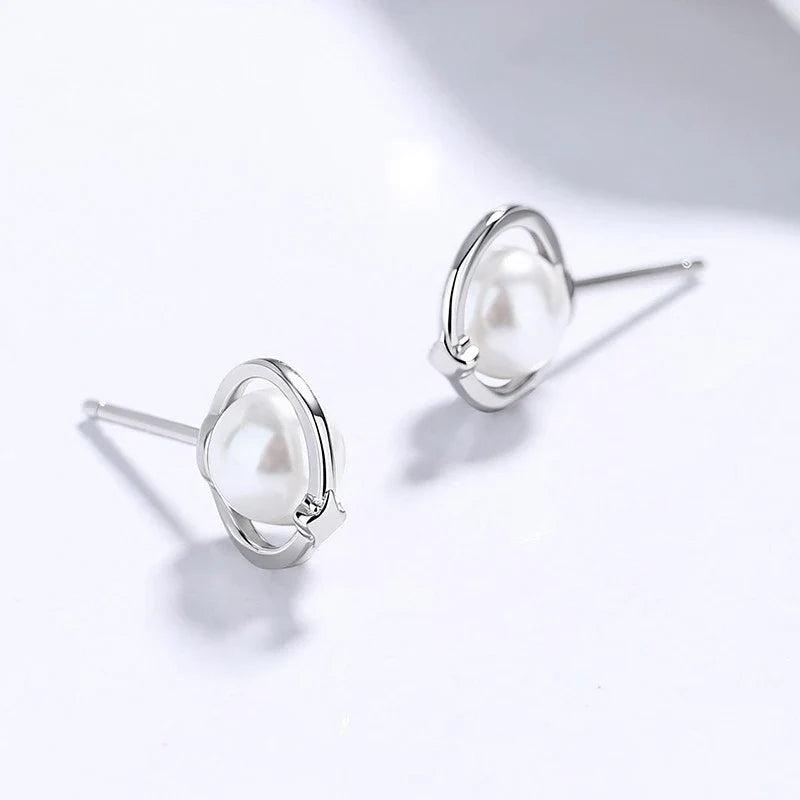 Aretes Planeta con Perla