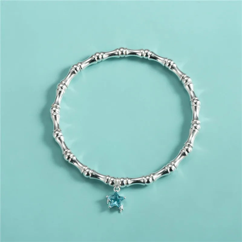Dije Estrella de Zirconia Blanca, Azul o Rosa