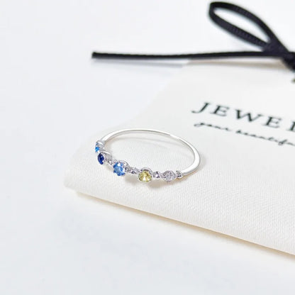 Anillo Elegante con Zirconias de Colores