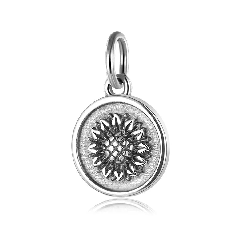 Dije Moneda con Girasol