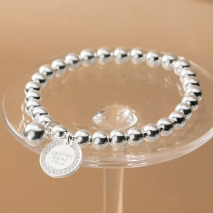 Pulsera Elástica de Bolitas con Moneda