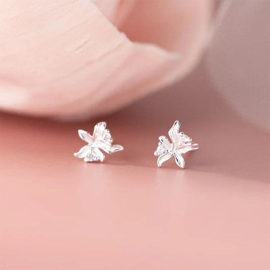 Aretes Flor de Botón Plateados