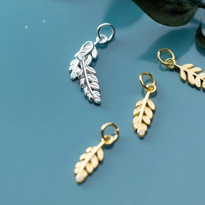 Dije Pluma con Zirconias