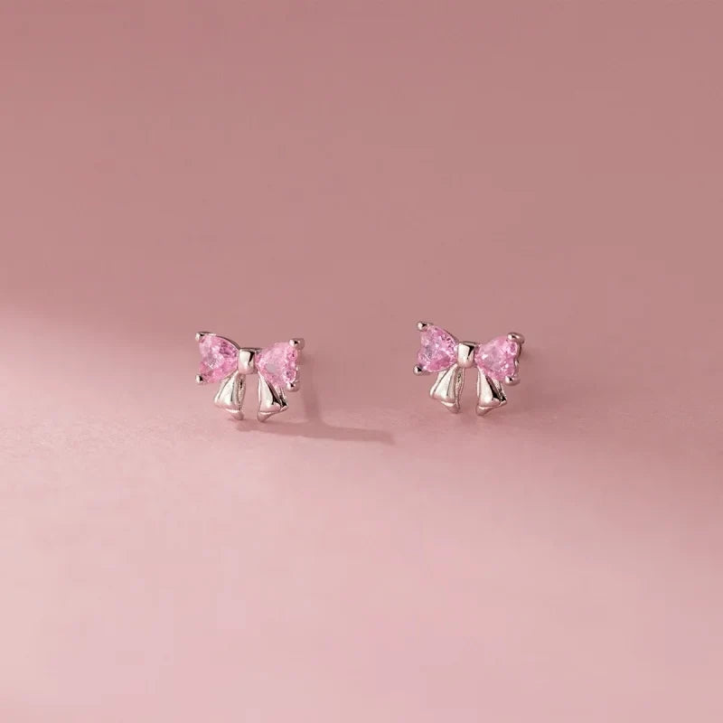 Aretes Moño con Zirconias Blancas o Rosas