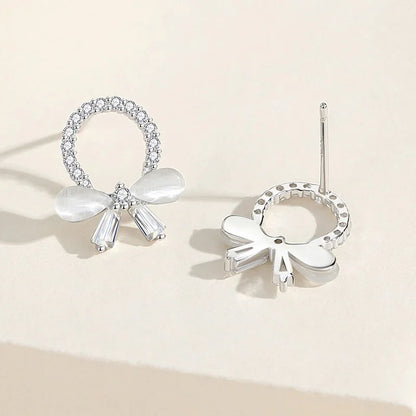 Aretes Corona de Flores con Moño