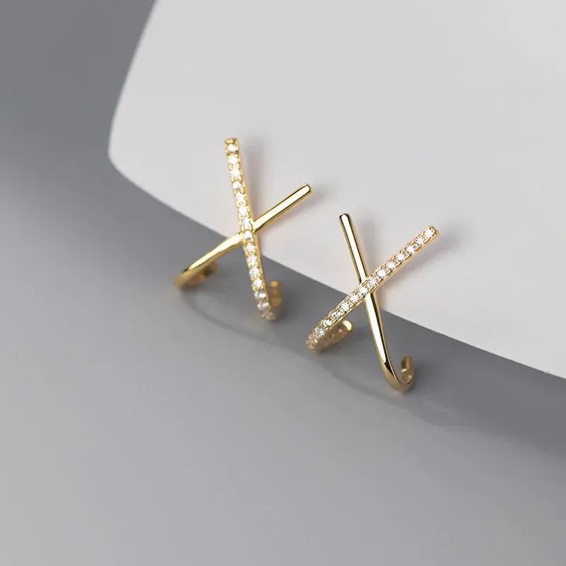 Aretes Cruz Delicada con Zirconias