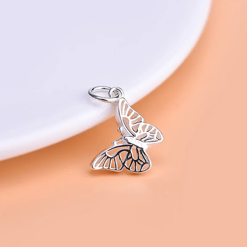 Dije Mariposa Calada