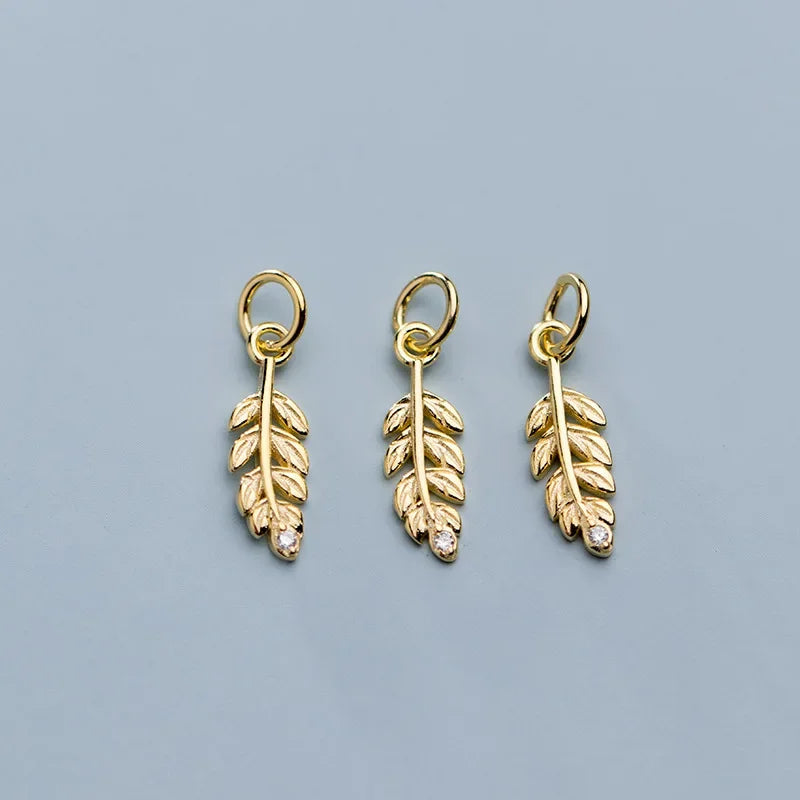 Dije Pluma con Zirconias