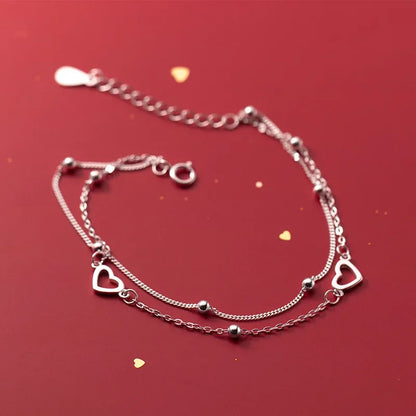 Pulsera Doble Cadena con Corazón