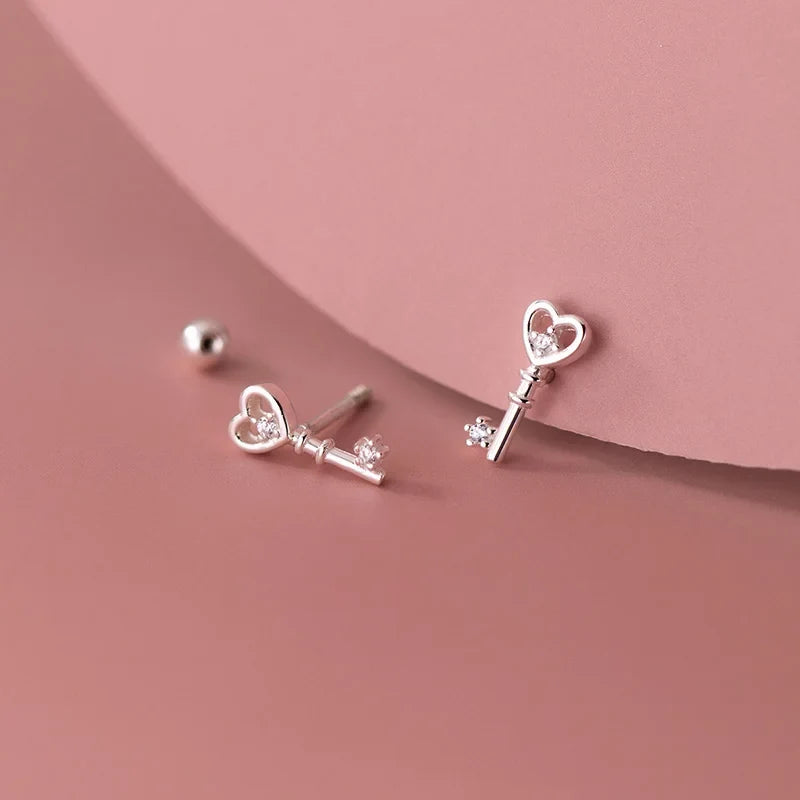 Aretes Corazón y Llave con Zirconias