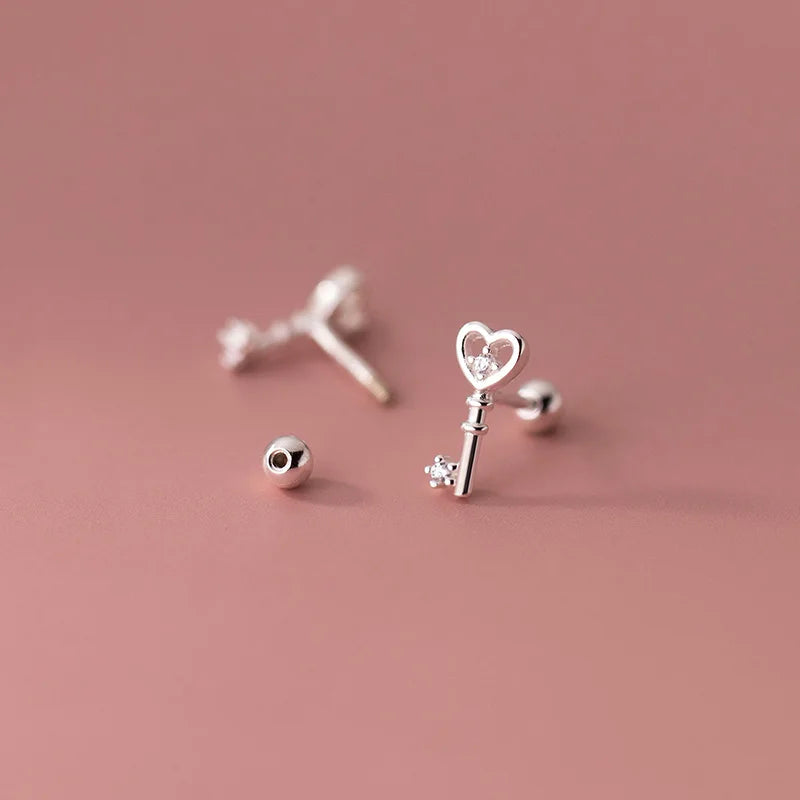 Aretes Corazón y Llave con Zirconias
