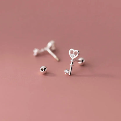 Aretes Corazón y Llave con Zirconias