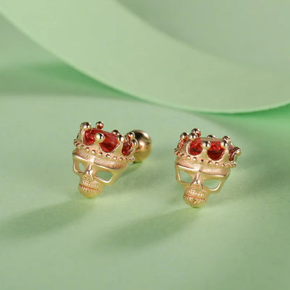 Aretes Calavera con Corona y Zirconia Roja