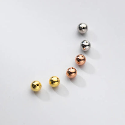 Aretes Bolita de Rosca