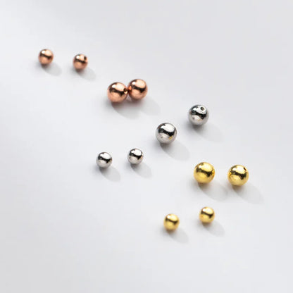 Aretes Bolita de Rosca