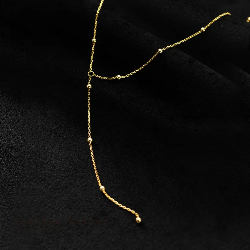 Collar con Flecos de Bolitas