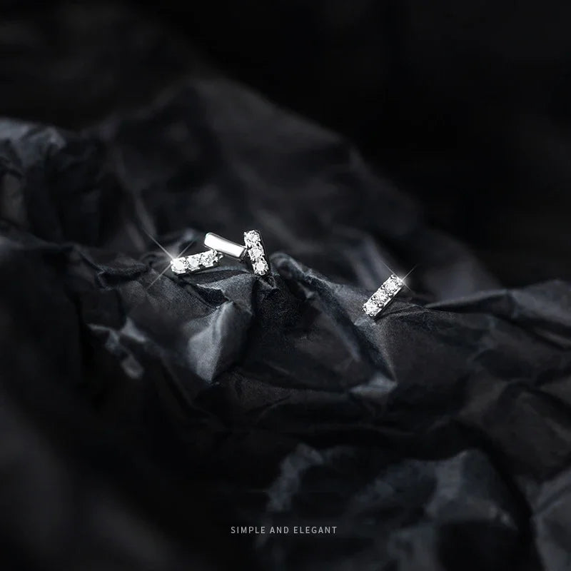 Aretes Asimétricos X y O