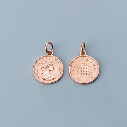 Dije Moneda de la Reina