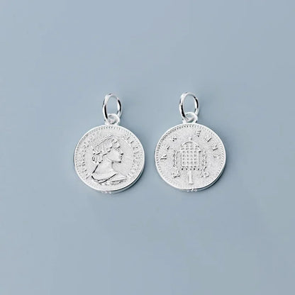 Dije Moneda de la Reina