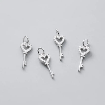 Dije Llave con Corazón