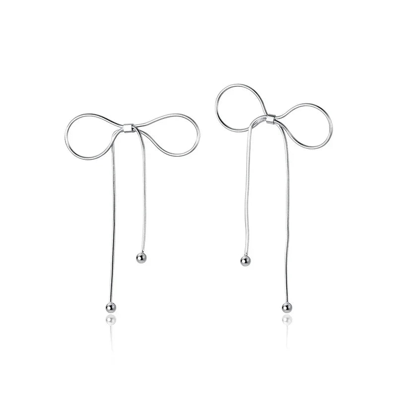Aretes Moño con Flecos