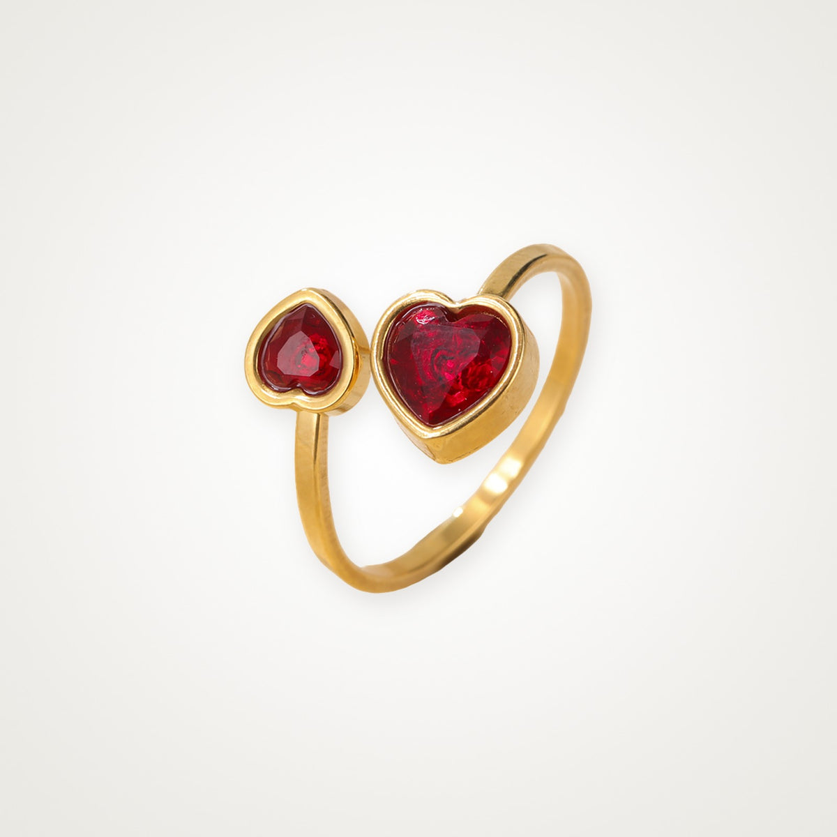 Anillo Corazones rojos dorado