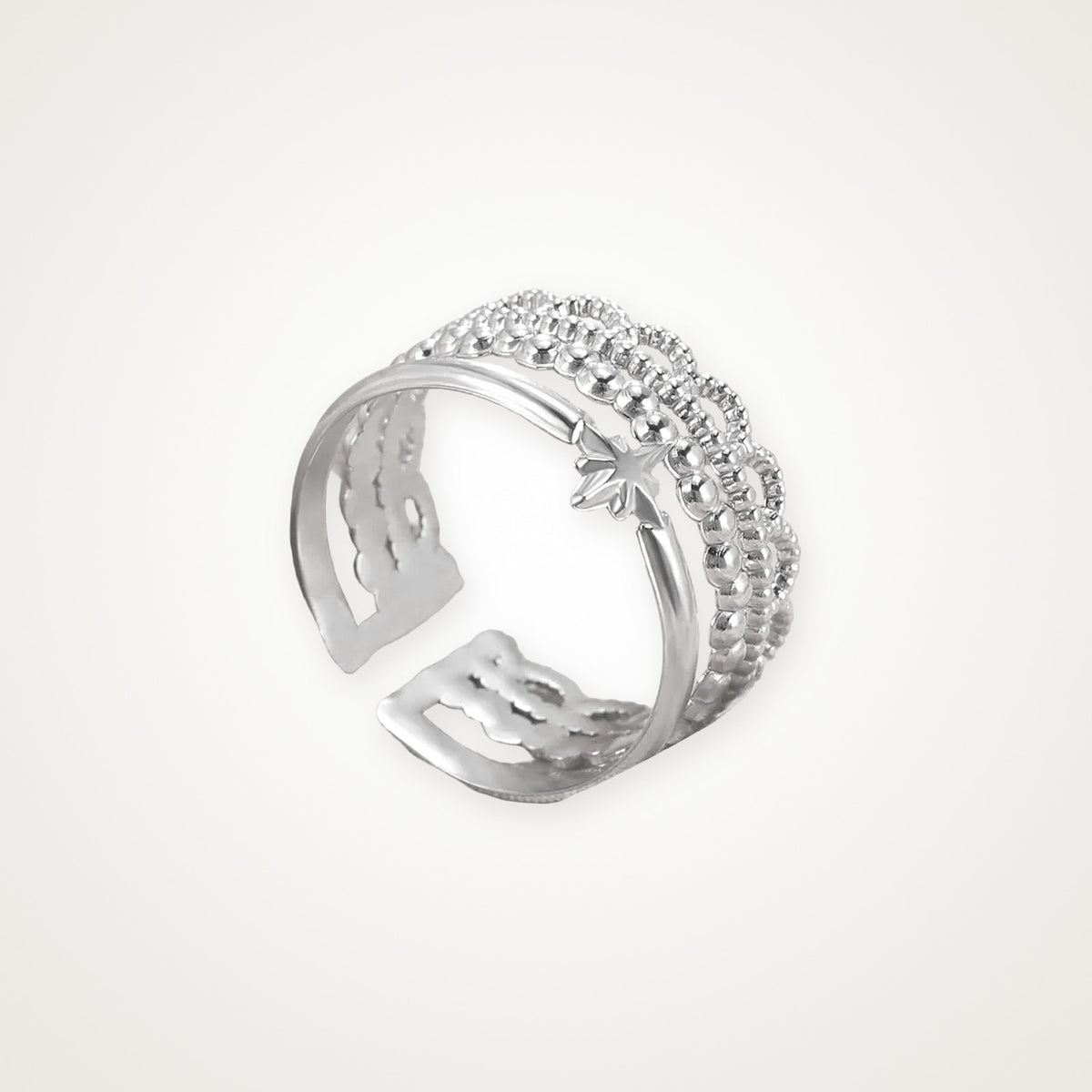 Anillo Estrella y capas plateado