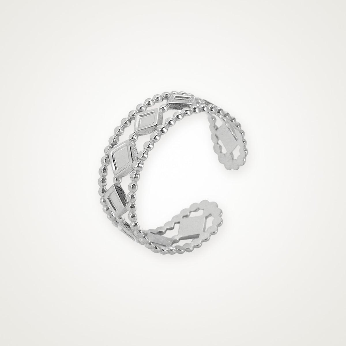 Anillo Rombos y bolitas plateado