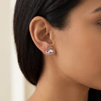 Aretes Ballenita plateados puestos
