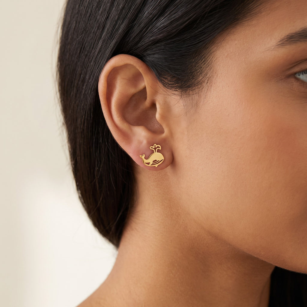 Aretes Ballenita dorados puestos