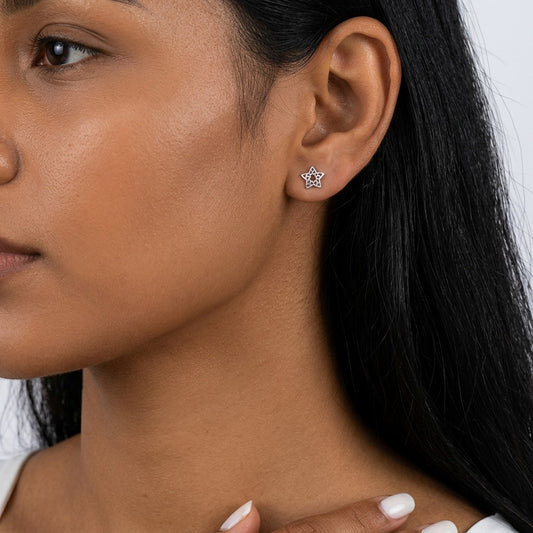 Aretes Bolita con Estrellas Caladas