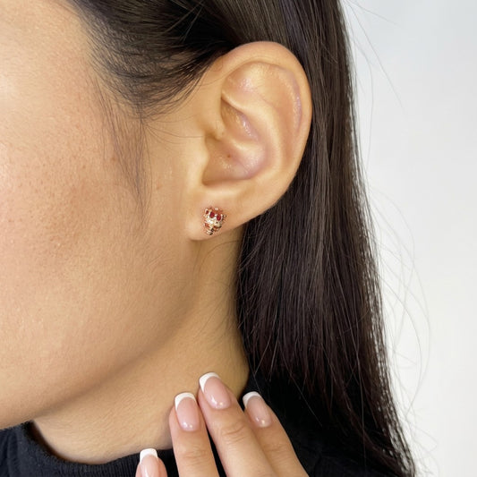 Aretes Calavera con Corona y Zirconia Roja