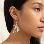 Aretes Colibrí plateados puestos